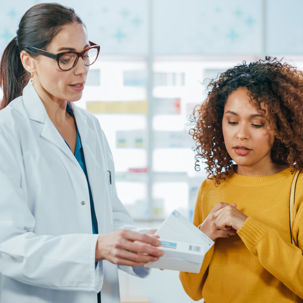 pharmacist assessing the young woman