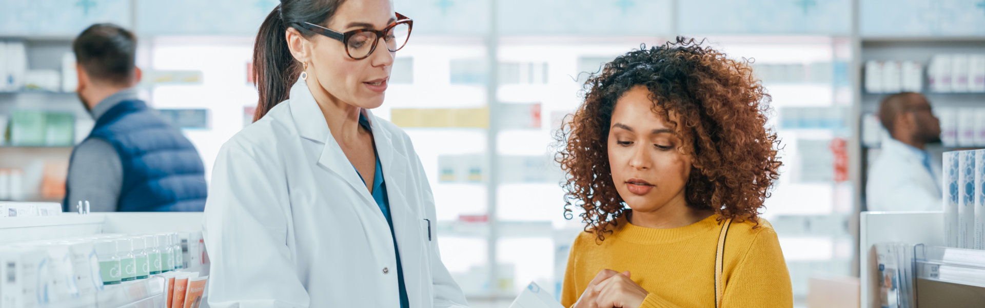 pharmacist assessing the young woman