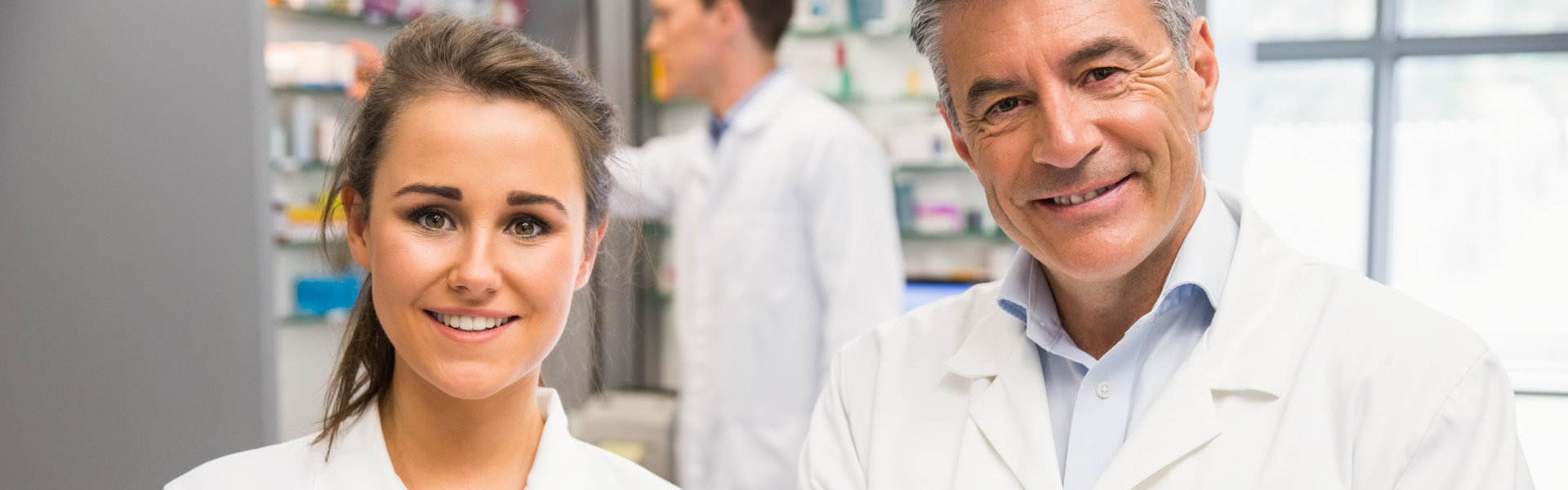 pharmacist and doctor smiling